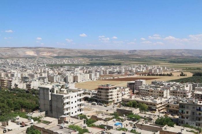 مسلحون ومستوطنون يبيعون أربعة منازل مستولى عليها من أصحابها الكرد في مدينة عفرين المحتلة