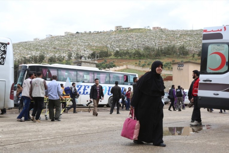 Seven settlement families leave a village in Bulbulah, to east of the Euphrates