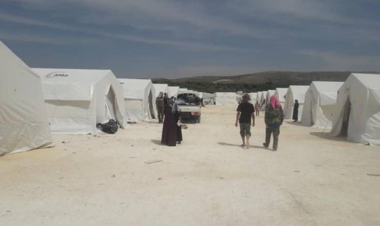 Turkish occupation sets up a refugee camp near the new Afrin Bridge