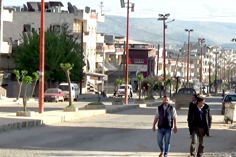 Young Kurdish men confront settlers tried to kill a Kurdish youth and seize his shop