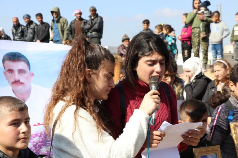 Afrin's forcibly displaced children demonstrate to denounce the Turkish shelling of al-Shahba