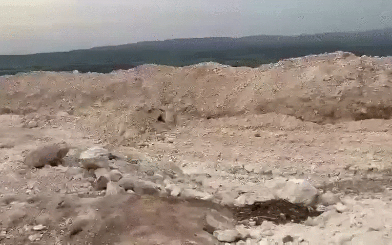 Tahrir al-Sham digging trench on Afrin-Idlib border