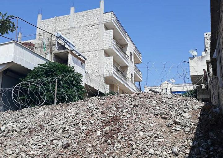 Turkish occupation turns a residential area in Afrin into a military zone and prevents their owners from returning to their homes