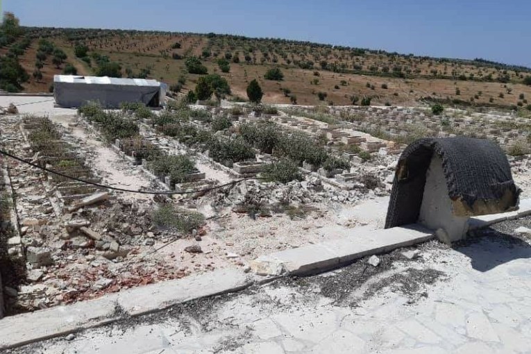 Turkish authorities bulldozers savagely destroy Kurdish martyrs cemetery in Afrin